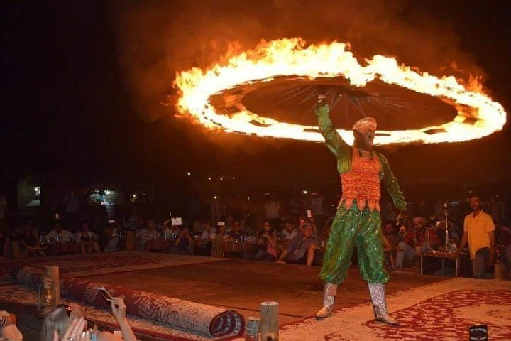 Experience the magic of the desert night where dazzling fire performances elevate your evening. Enjoy traditional dining and immerse yourself in rich Arabian culture under the stars.